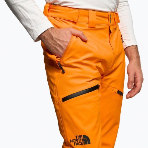 Pánské lyžařské kalhoty The North Face Chakal orange NF0A5IYV78M1