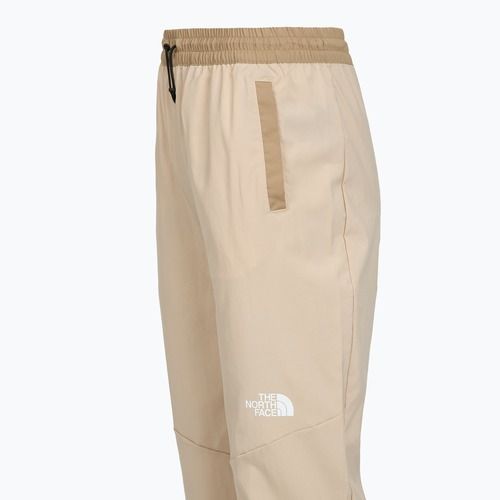 Dámské trekové kalhoty The North Face Ma Wind Track granite sand/kelp tan