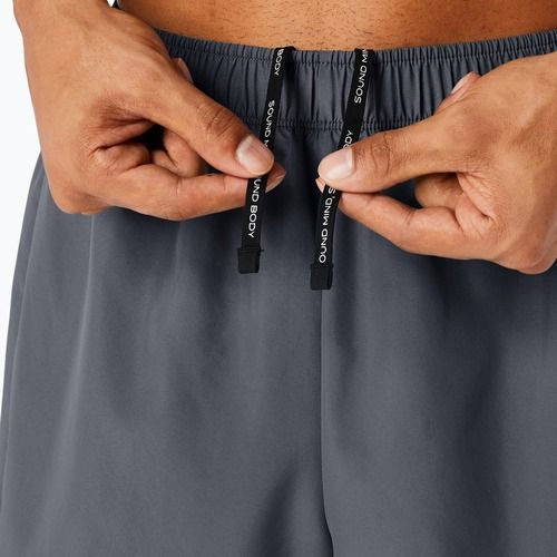 Pánské běžecké kraťasy  ASICS Icon performance carrier grey / safety yellow