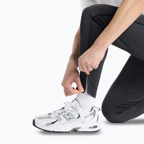 Pánské běžecké kalhoty New Balance Sport Knit black