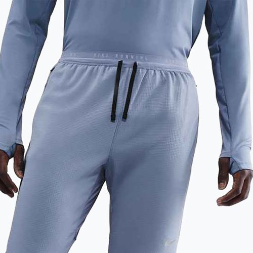 Pánské běžecké kalhoty Nike Stride Dri-Fit world indigo
