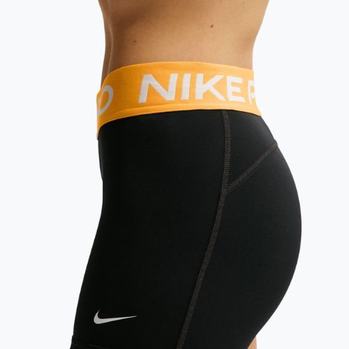 Dámské šortky Nike Pro Mid-Rise Biker 3" black/university gold/white