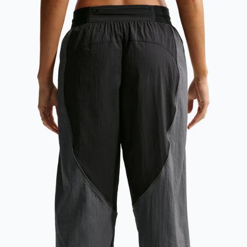 Dámské běžecké kalhoty Nike Swift UV Repel Mid-Rise black/iron grey