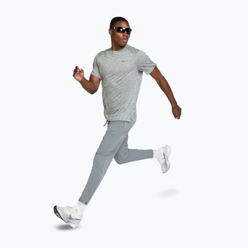 Pánské běžecké kalhoty Nike Stride Dri-Fit Woven smoke grey