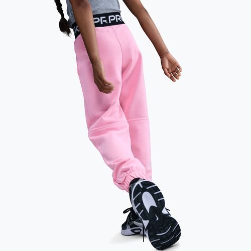 Dětské tepláky Nike Pro Fleece Dri-Fit med soft pink/med soft pink/black/white