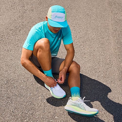 Pánské běžecké boty ASICS Gel-Kayano 33 white/stadium orange