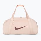 Dámská sportovní taška Nike Gym Club 24 l guava ice/guava ice/night maroon