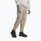 Pánské tréninkové kalhoty Under Armour Unstoppable Joggers city khaki/black