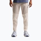 Pánské běžecké kalhoty Nike Stride Repel Woven cream li/birch/natural