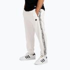 Pánské kalhoty  Pitbull Trackpants Tape Logo Terry Group off white