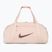 Dámská sportovní taška Nike Gym Club 24 l guava ice/guava ice/night maroon
