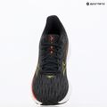 Dámské běžecké boty Mizuno Wave Rider 28 black/evening primrose/poppy red 9