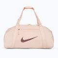 Dámská sportovní taška Nike Gym Club 24 l guava ice/guava ice/night maroon