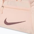 Dámská sportovní taška Nike Gym Club 24 l guava ice/guava ice/night maroon 4