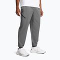 Pánské tréninkové kalhoty Under Armour Unstoppable Joggers castlerock/black