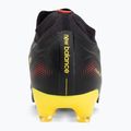 Kopačky New Balance Tekela Team Low V5 FG black 100/punch yellow/fire cracker 6