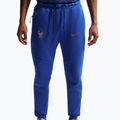 Pánské fotbalové kalhoty Nike FFF Tech Fleece Joggers game royal/metallic copper