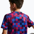 Dětské fotbalové tričko Nike FC Barcelona Dri-Fit Pre-Match noble red/mineral yellow 7