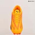 Fotbalové boty PUMA Ultra Play FG/AG sunset glow/puma black/sun stream 9