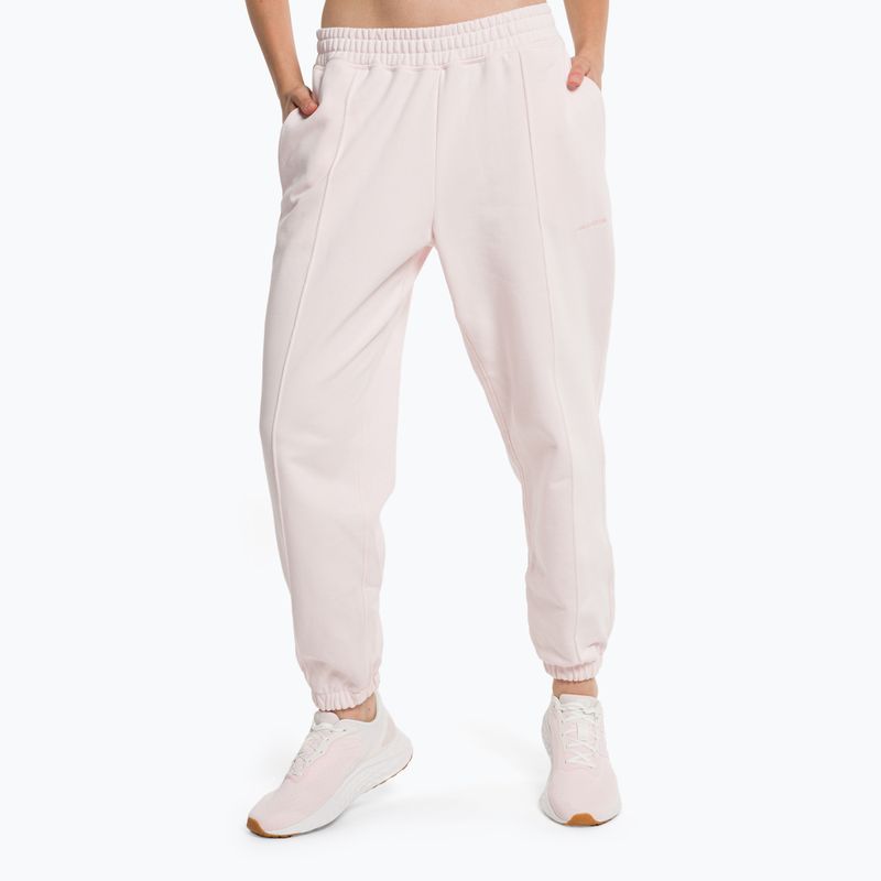 Dámské tréninkové kalhoty New Balance Athletics Nature State French Terry pink WP23553WAN