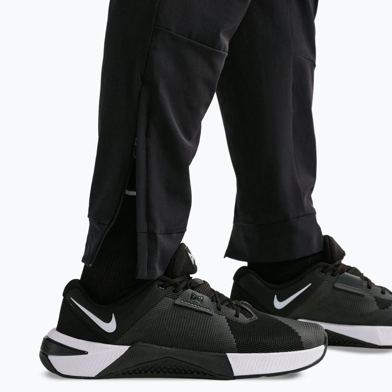 Pánské kalhoty Nike Unlimited black/black/black 6