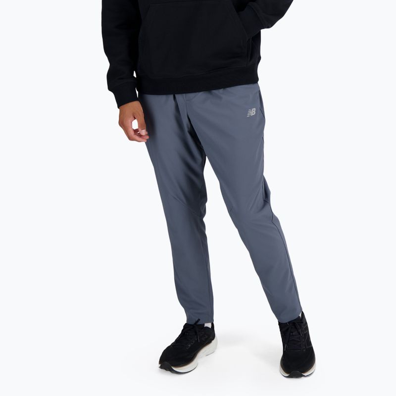Pánské kalhoty New Balance AC Stretch Woven 29 Inch graphite