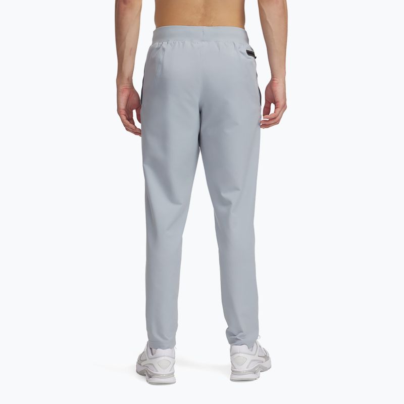 Pánské tréninkové kalhoty Under Armour Unstoppable Tapered harbor blue/black 3