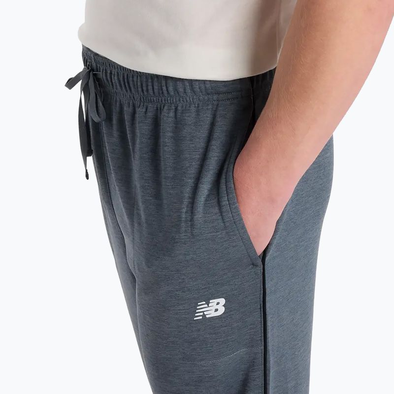 Pánské běžecké kalhoty New Balance Sport Knit graphite 5