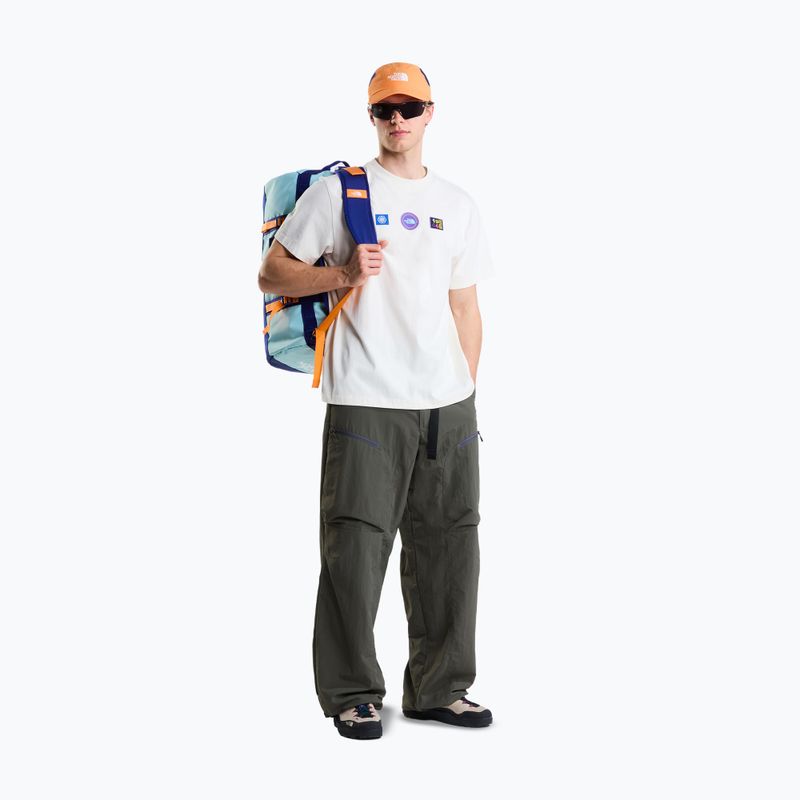 Pánské tričko na lezení The North Face Explorer Badges RLX SS Tee Graphic white dune 2