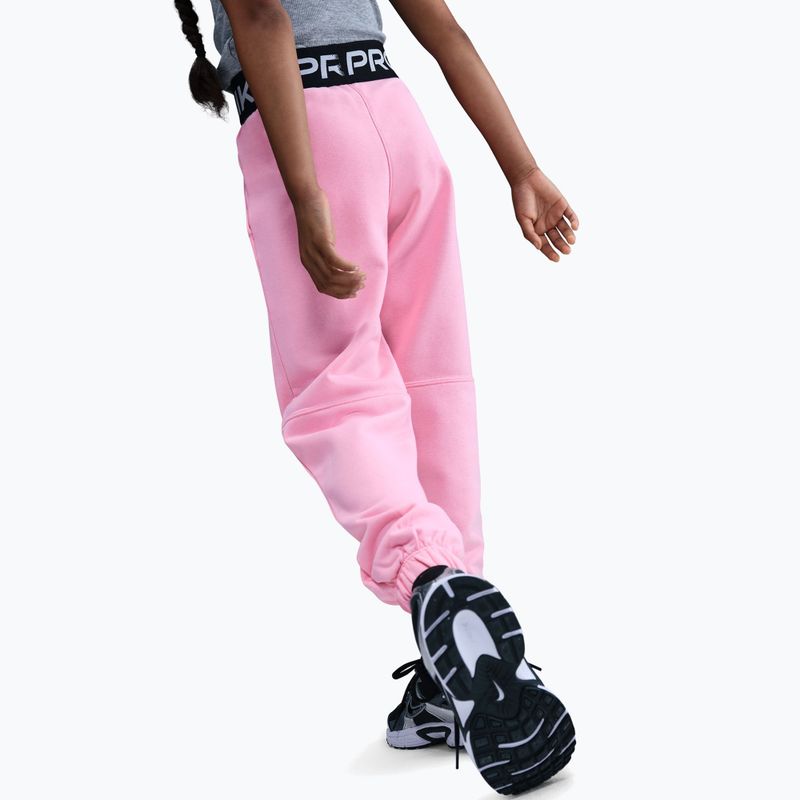 Dětské tepláky Nike Pro Fleece Dri-Fit med soft pink/med soft pink/black/white 6