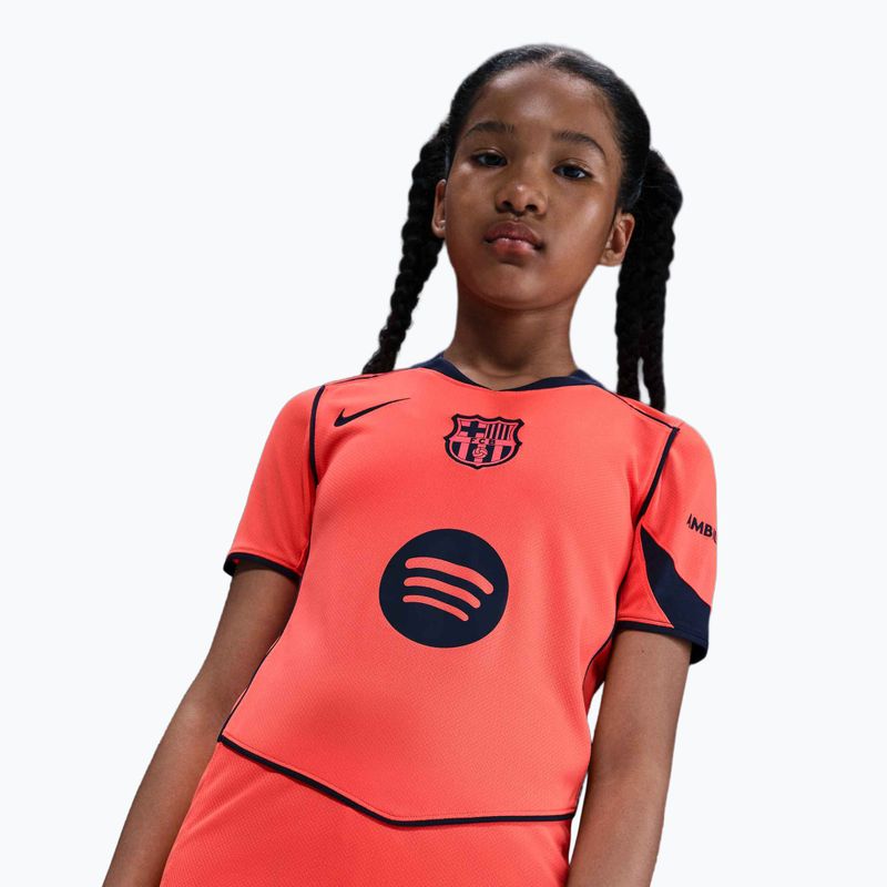 Dětský fotbalový dres Nike FC Barcelona 2025/26 Stadium Third Jr bright mango/midnight navy/midnight navy 7