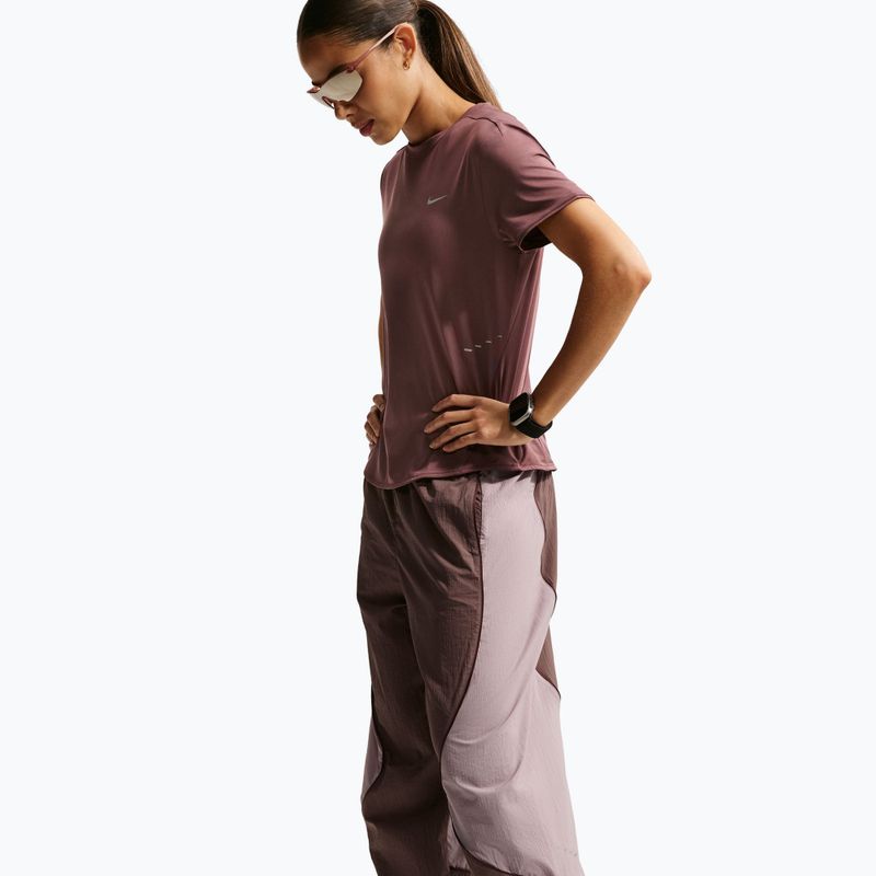 Dámské běžecké kalhoty Nike Swift UV Repel Mid-Rise tattoo/light violet ore 6