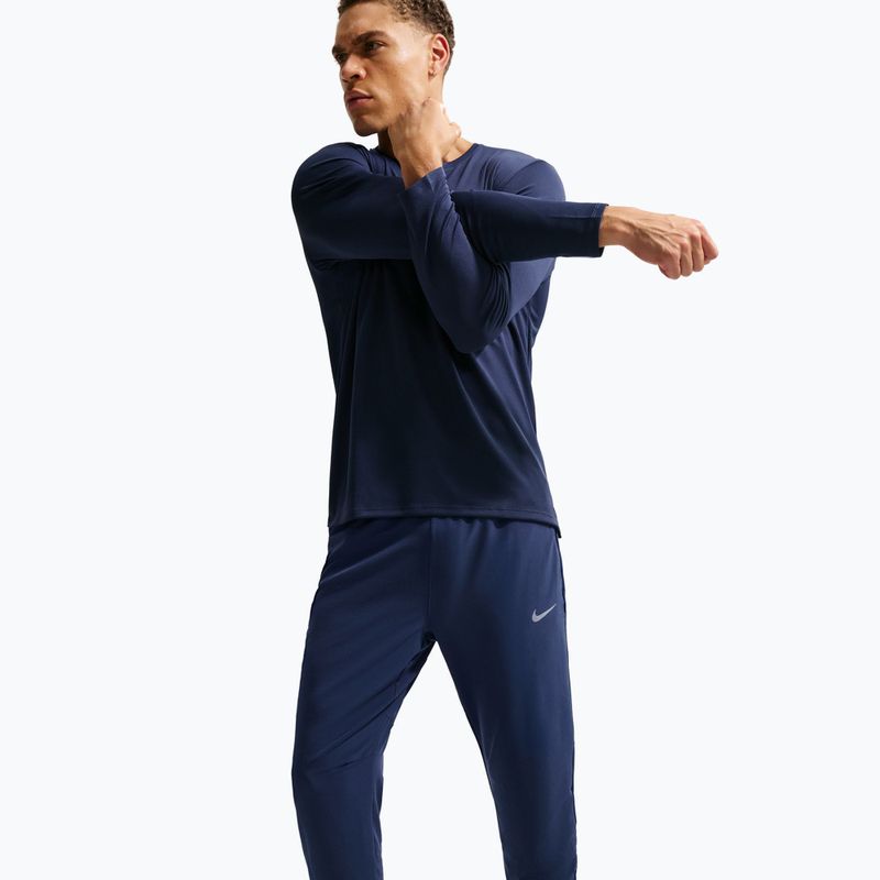 Pánské běžecké kalhoty Nike Stride Dri-Fit Woven midnight navy 4