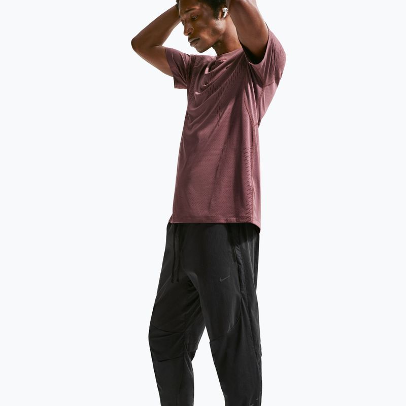 Pánské běžecké kalhoty Nike Stride Repel Woven black/black/black/black 4