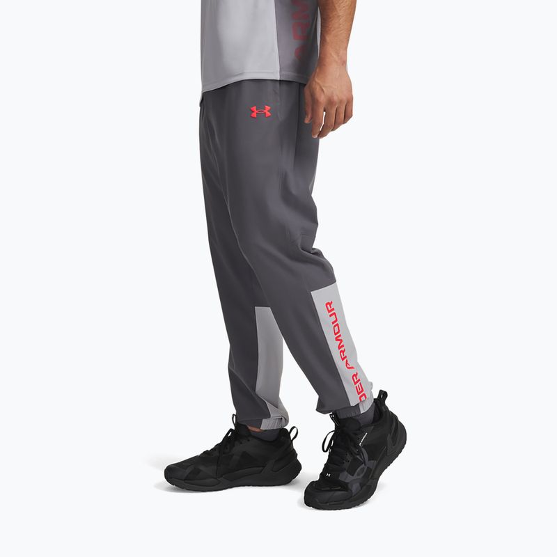 Pánské tréninkové kalhoty Under Armour Tech Utility Woven Pants castlerock/mod gray/racer red 4