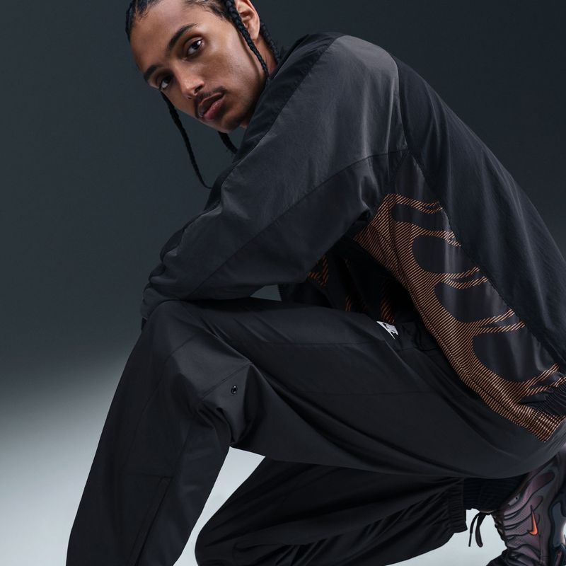 Pánské kalhoty Nike Windrunner Lined black/white 9