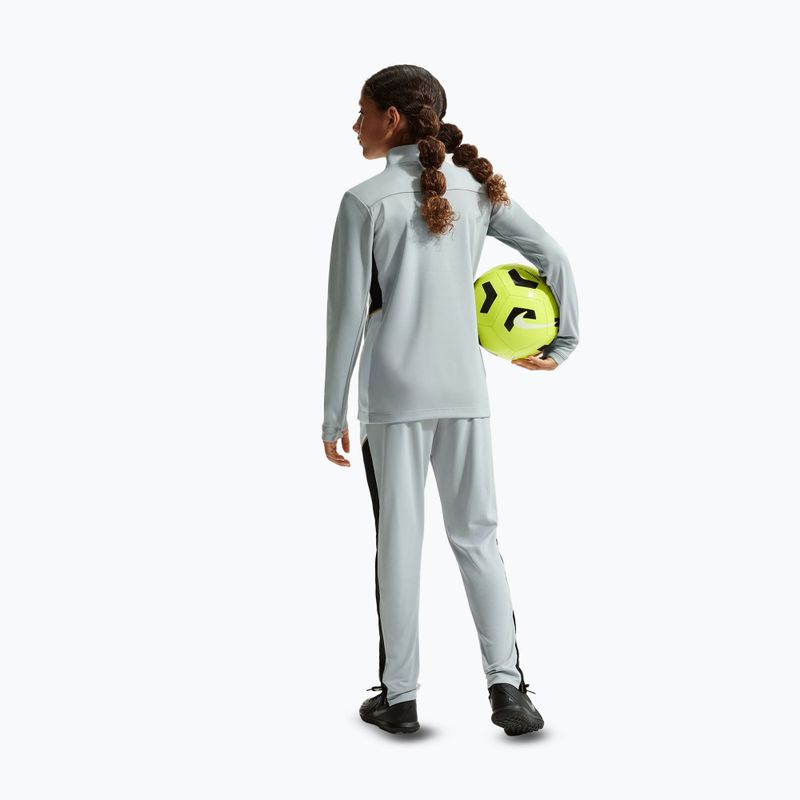 Dětské tepláky Nike Academy Dri-Fit Jr light smoke grey/white/black/metallic gold 4