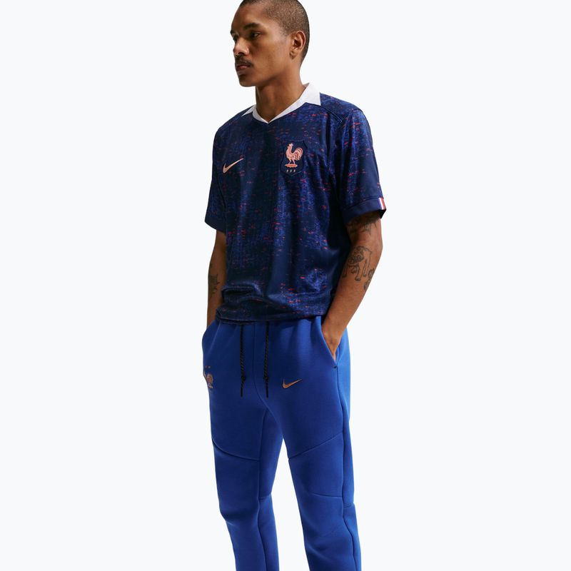 Pánské fotbalové kalhoty Nike FFF Tech Fleece Joggers game royal/metallic copper 4