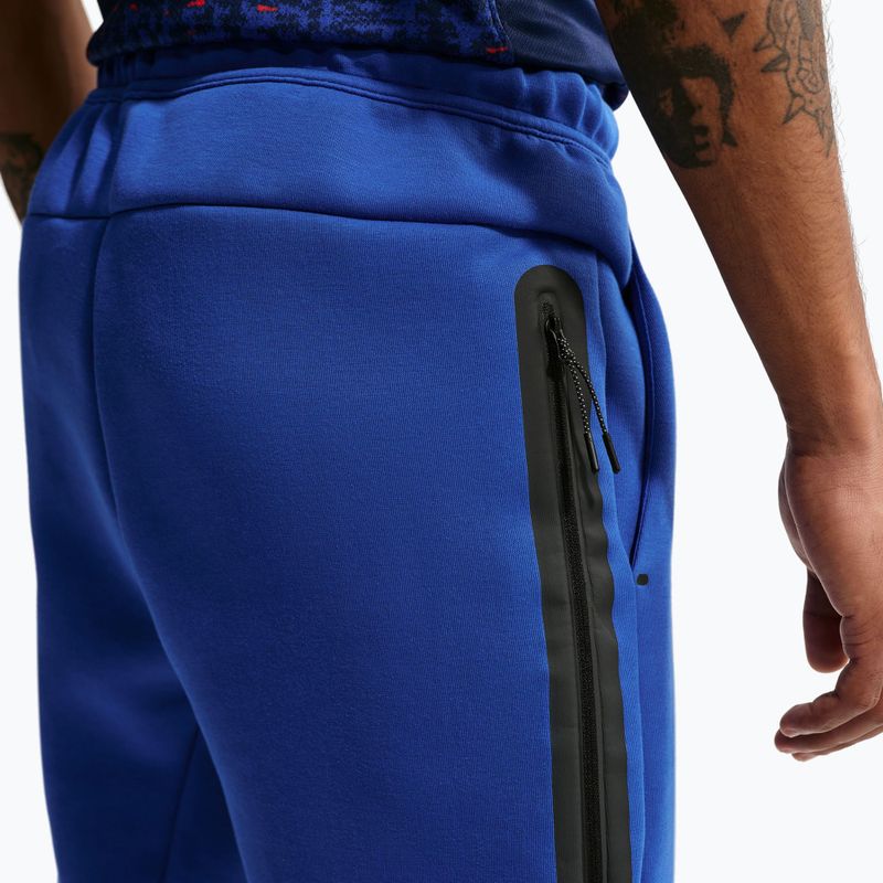 Pánské fotbalové kalhoty Nike FFF Tech Fleece Joggers game royal/metallic copper 5