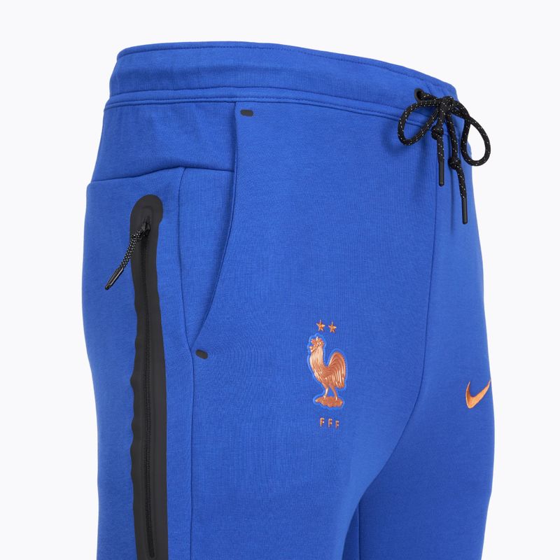 Pánské fotbalové kalhoty Nike FFF Tech Fleece Joggers game royal/metallic copper 8