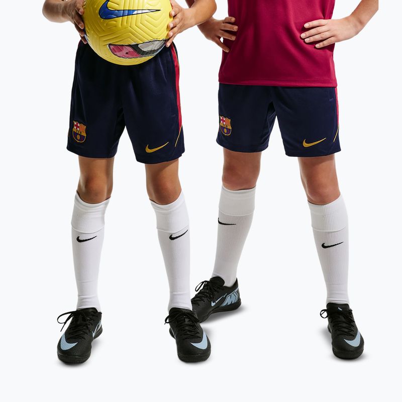 Dětské fotbalové šortky Nike FC Barcelona Strike blackened blue/noble red/mineral yellow