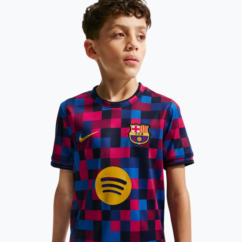 Dětské fotbalové tričko Nike FC Barcelona Dri-Fit Pre-Match noble red/mineral yellow 5