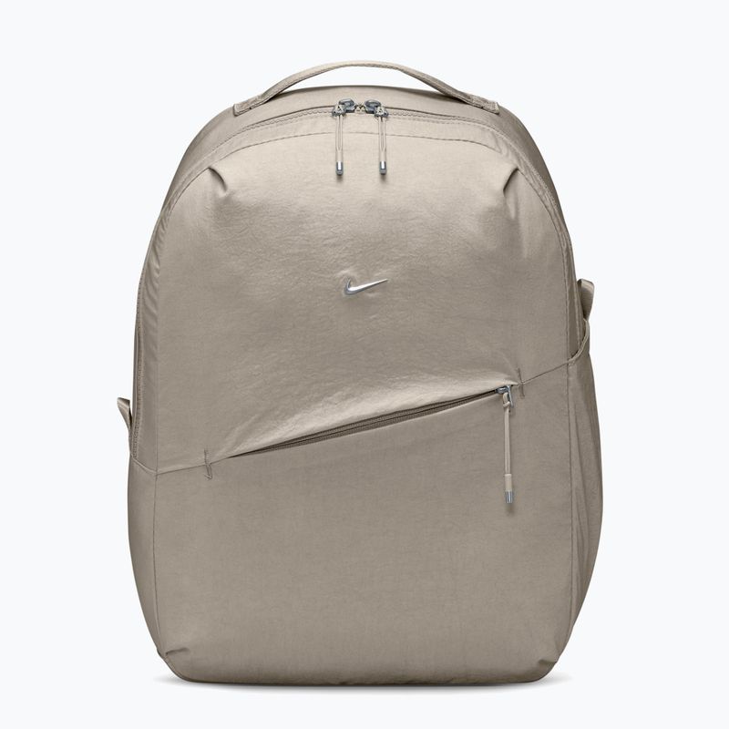 Městský batoh Nike Aura 24 l cream ii/cream ii/metallic silver brl