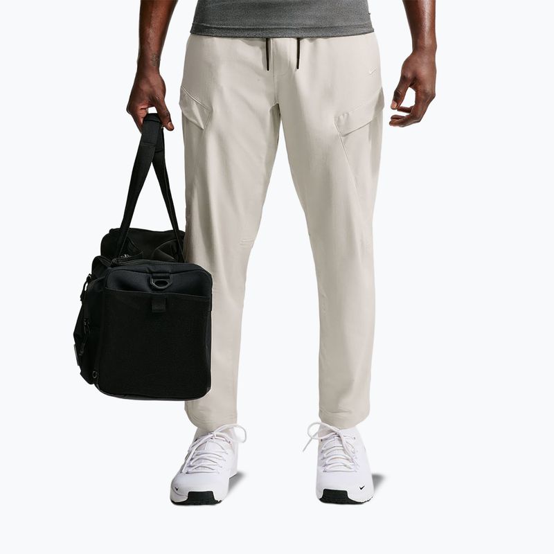 Pánské kalhoty Nike Unlimited ight orewood brown/black/light orewood brown 7