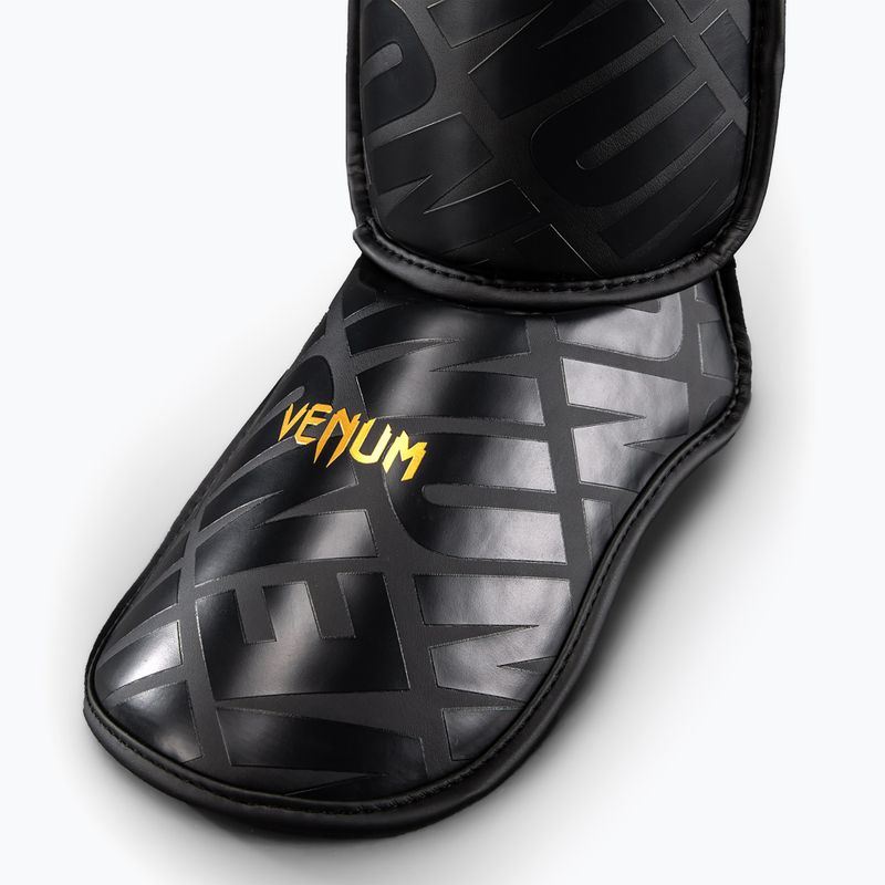 Chrániče holení Venum Contender 1.5 XT 3D Shin black/gold 3