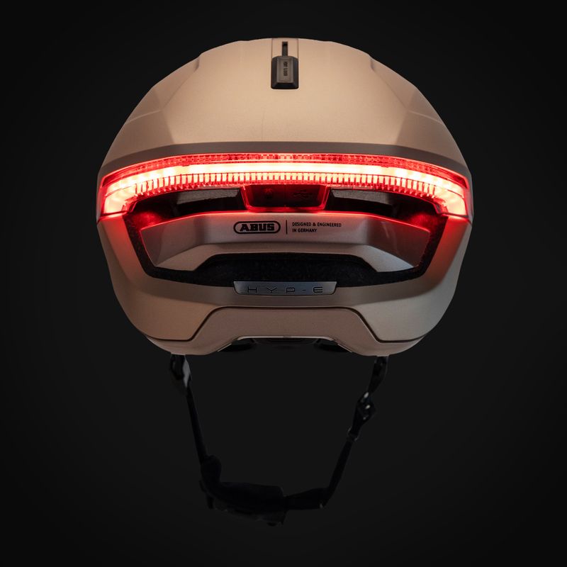 Cyklistická helma s blinkry ABUS Hyp-E champagne gold 9