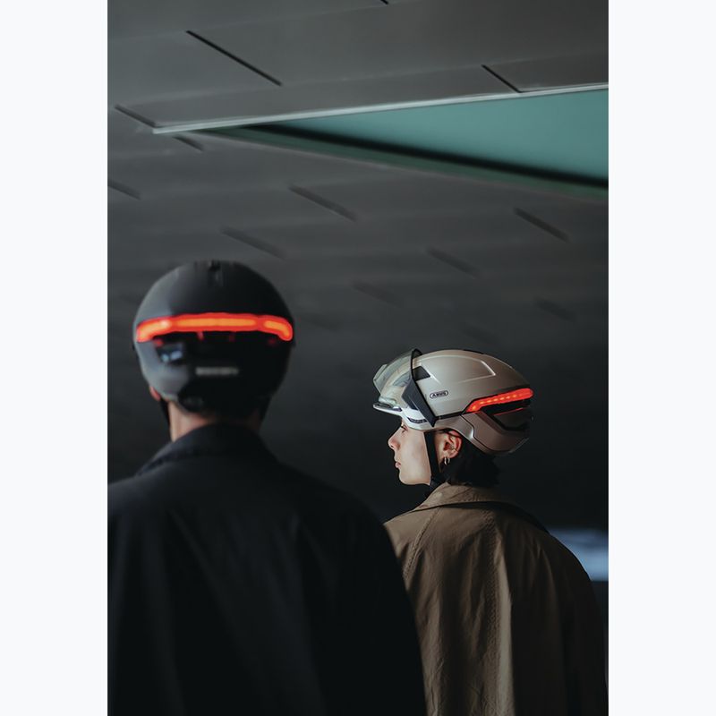 Cyklistická helma s blinkry ABUS Hyp-E champagne gold 8