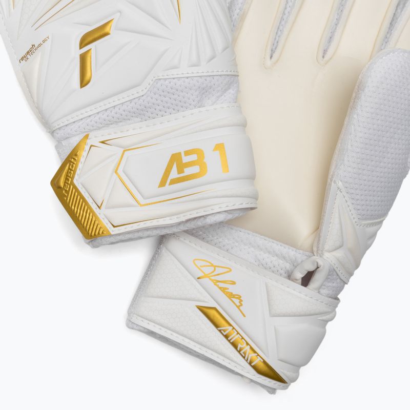 Dětské brankářské rukavice Reusch Attrakt AB1 Solid Junior white/gold 5
