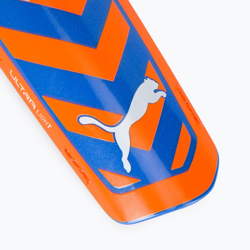 Fotbalové chrániče PUMA Ultra Light Strap oranžovo-modré 030875 01 4