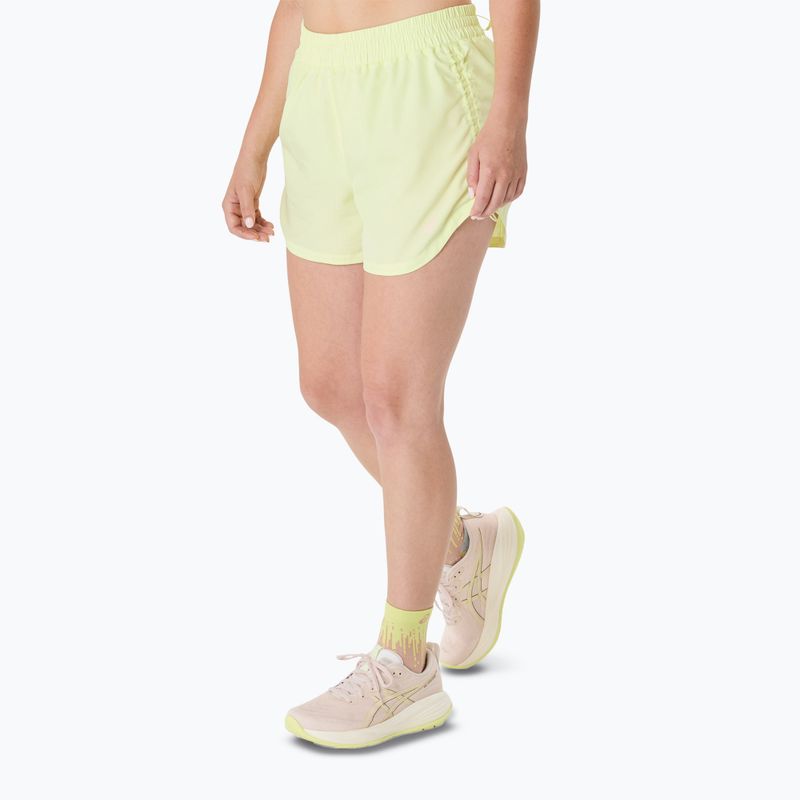 Dámské běžecké šortky ASICS Nagino Run Adjustable 4IN huddle yellow 4